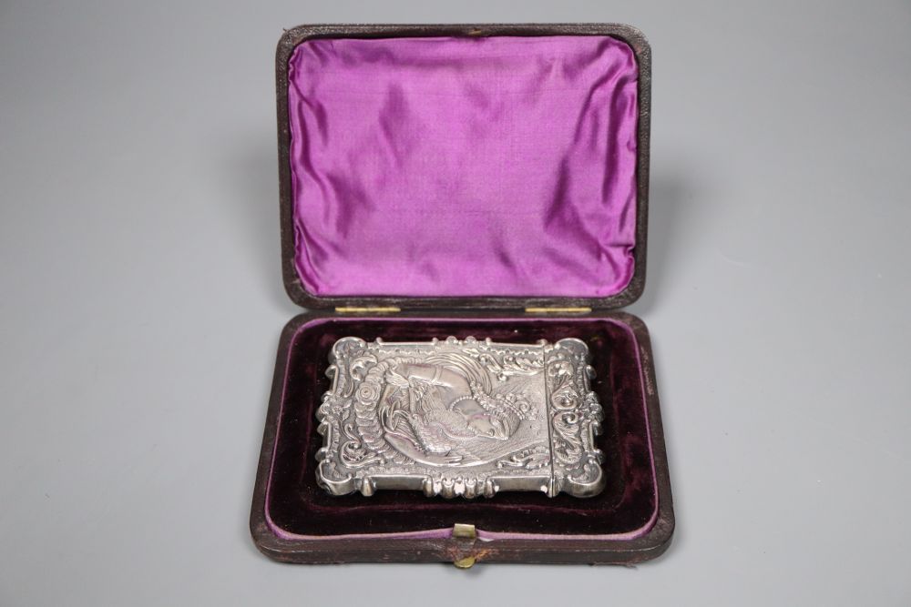A 19th century white metal card case, the front and back embossed with Ganymede & the Eagle and cathedral, unmarked,